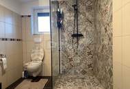 Neuwertiges Einfamilienhaus in Traiskirchen mit Garten, Terrasse & Garage – 3 Zimmer!