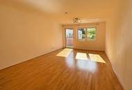 Modernes Wohnhighlight im Grünen: 3-Zimmer mit Garten-Balkon und 2 Garagenplätzen