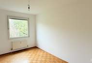 Gepflegte Wohnung mit Loggia, Grünblick, 2 KFZ Stellplätze und idealer Anbindung | ZΞLLMANN IMMOBILIEN