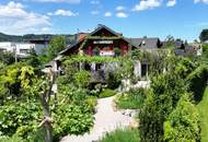 Garten zum Entspannen mit geschmackvoll ausgestattetem Haus