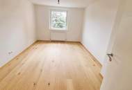 Kernsanierte, helle Dreizimmerwohnung mit großer Loggia und großem Keller!