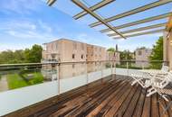 Exklusives Wohnerlebnis in St. Martin: Neuwertige 3-Zimmer-Wohnung mit hochwertigem Mobiliar, großem Südwest-Balkon und Tiefgaragenstellplatz