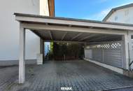 Gartenwohnung mit Reihenhaus-Charakter inklusive Doppelcarport – ruhig & zentral