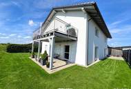 Moderne Gartenwohnung mit großzügigen Terrassen in sonniger Ruhelage