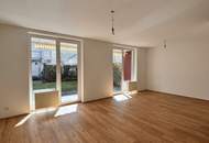 100 m² Wohngefühl auf zwei Ebenen | 4-Zimmer-Gartenmaisonette mit Südterrasse und Balkon | Inklusive Tiefgaragenstellplatz!