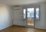 Lichtdurchflutete 2-Zimmer-Dachgeschosswohnung mit 40 m² Terrasse in ruhiger Lage