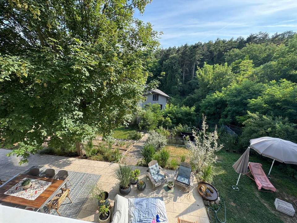 TRAUMHAFTES EINFAMILIENHAUS IM GRÜNEN MIT BLICK AUF DIE SKYLINE VON WIEN