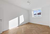 Luxuriöse Dachgeschosswohnung in toller Lage des 4. Bezirks mit schönem Ausblick über Wien