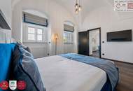 Leben im historischen „Freihof“ in Döbling: großzügige 3 Zimmer Wohnung mit Blick auf die Donau - Optional mit Parkplatz & Garten mit Pool