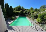 Charmantes Zweifamilienhaus mit idyllischem Naturpool