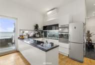 Wohnen über den Dächern von Graz mit Blick auf den Schlossberg: Exklusive Stadtwohnung mit Terrasse