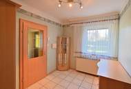 Baugrundstück mit Einfamilienhaus