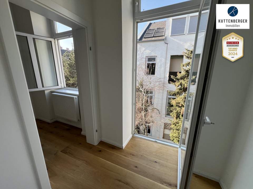 2 Zimmer-Altbau-Balkonwohnung mit Gartenblick!