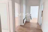 Sonnige Wohnung mit Balkon, Blick in den Garten, Ruhelage am grünen Hügel über der Stadt