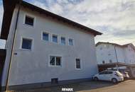 Gartenwohnung mit Reihenhaus-Charakter inklusive Doppelcarport – ruhig & zentral