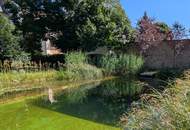Exklusives Refugium mit Schwimmbiotop – Stilvoll möbliertes 2-Zimmer-Apartment in Ruhelage