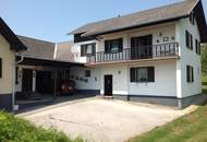 Zweifamilienhaus mit Nebengebäuden – Option: Kauf von 9.937 m² angrenzender landwirtschaftlicher Fläche möglich