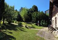 SONNIG GELEGENER BAUGRUND MIT GEBÄUDEALTBESTAND