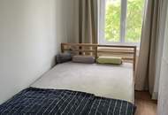 Schöne DG-Wohnung in ruhiger Lage mit hochwertiger Küche & langem Balkon