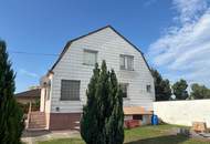 Einfamilienhaus mit geräumigen Scheune und viel Grünland!