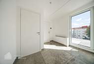 Erstbezug! Elegante 3-Zimmer Dachgeschosswohnung mit Balkon