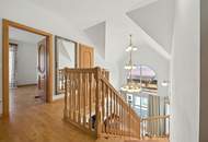 High-end living in a peaceful green location! A feel-good retreat in a class of its own: tradition meets state-of-the-art comfort!