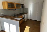 UNBEFRISTET und Nähe Bahnhof - nette 2-Zimmer-Wohnung, separate Küche mit kleinem Essplatz, Gartennutzung