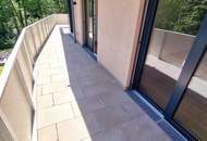 Ein Platz, der mehr kann als wohnen. Geniale Neubauwohnung mit WOW-Effekt! Riesiger Balkon und Terrasse + Privater Dachgarten + Grün wohin das Auge reicht + Luftwärmepumpe!