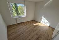 Geförderte Neubauwohnung mit Terrasse im 1. Stock