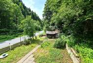 Attraktives Immobilienangebot in Bad Eisenkappel: Zwei sanierungsbedürftige Häuser mit Garten, Garagen und viel Potenzial