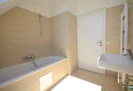 Exklusive 2‑Zimmer‑DG‑Wohnung mit sonniger Hofterrasse und Weitblick über Wien