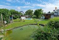 Einfamilienhaus mit Pool und großem Garten in verkehrsgünstiger Lage