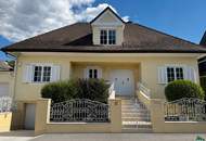 Elegante Villa in idyllischer Wienerwaldlage mit Pool und großem Garten