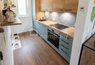 Zwei moderne Wohneinheiten mit Badeteich-Blick: ideal für zwei Familien
