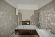 Sanierungsbedürftige Eigentumswohnung mit großzügiger Terrasse