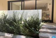 Erstbezug: Elegante Gartenwohnung mit Outdoor Pool