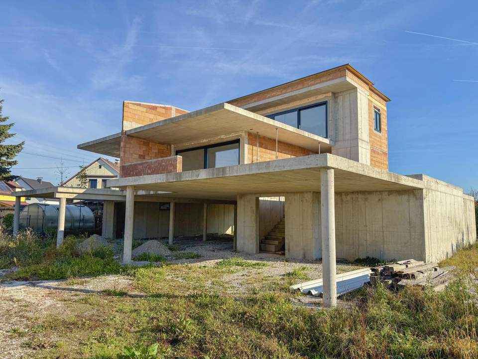 Zwei Einheiten, eine Vision - moderne Architektur in Rohform