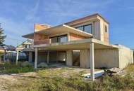 Zwei Einheiten, eine Vision - moderne Architektur in Rohform