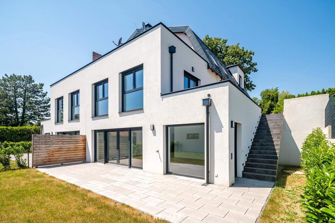 Erstbezug: Großzügiger Familientraum mit unverbaubarem Grünblick!