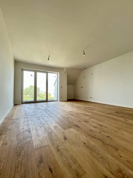 Erstklassige 73.8m² Wohnung mit Balkon in Mannswörth, Perfekt für Erstbezug!