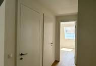 Eleganz trifft Lage – Neubau-Dachgeschosswohnung in Toplage