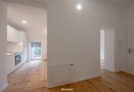 Sanierter Altbau mit modernem Neubau