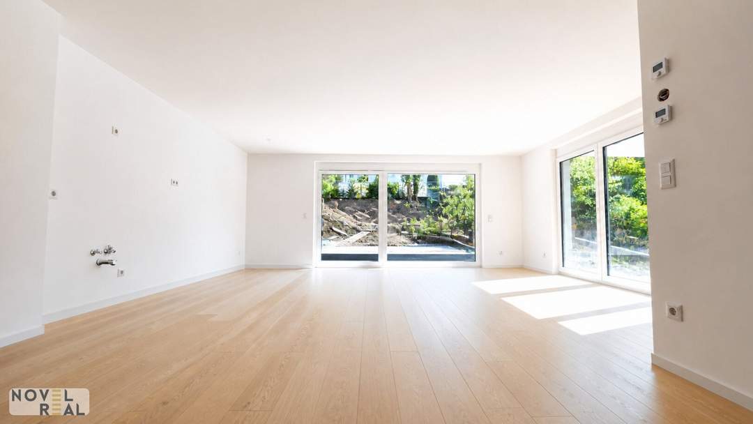 Kurz vor Fertigstellung: Großzügige 4,5-Zimmer-Gartenwohnung mit Terrasse, drei Balkonen und exklusivem Highlight – Pool im Gemeinschaftsgarten!