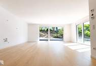 Kurz vor Fertigstellung: Großzügige 4,5-Zimmer-Gartenwohnung mit Terrasse, drei Balkonen und exklusivem Highlight – Pool im Gemeinschaftsgarten!
