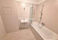 Design-Neubau: 3 Zimmer mit großem Balkon & Komforttechnik