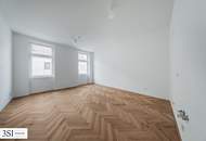 Erstbezug nach Sanierung in der Klausgasse - 1-Zimmer-Altbauwohnung mit elegantem Fischgrätparkett