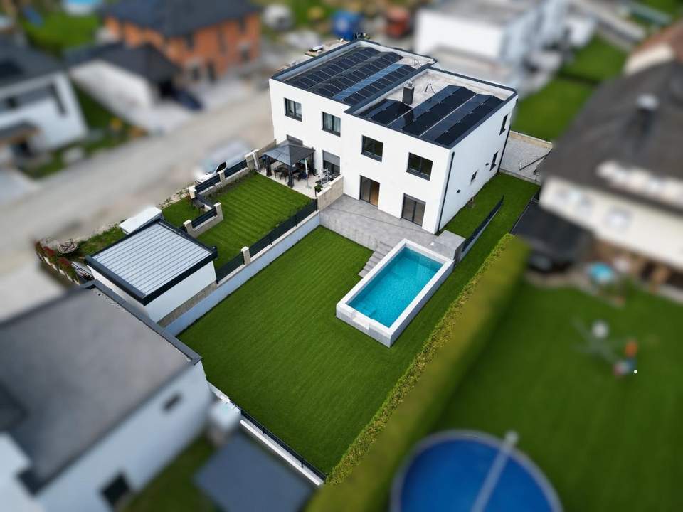 "Ihr neues Zuhause in Reichersdorf – Doppelhaushälfte mit Pool & Traumgarten"