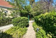Elegante Dachgeschosswohnung mit Gartenblick, Terrassen und Garage