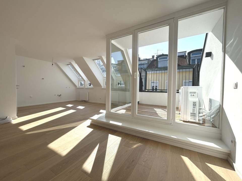 1180! Hochwertig sanierte, sehr schöne DG-Maisonette mit Terrasse und Klimaanlage in toller Lage!