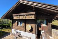 Idyllisches Holzblockhaus in Naturrandlage